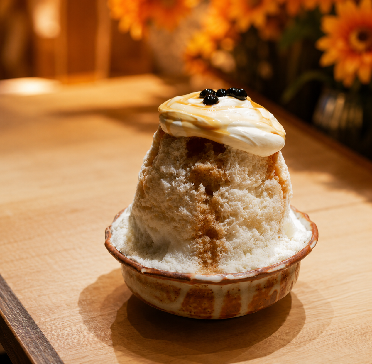 廚くろぎのかき氷。氷の上にクリームと蜜を重ねた和素材の一杯